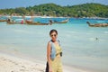 Portrait woman are Stroll the beach , Koh Lipe. Royalty Free Stock Photo