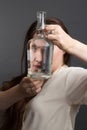 Portrait of woman in Studio, using a water bottle Royalty Free Stock Photo
