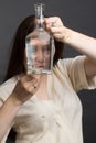 Portrait of woman in Studio, using a water bottle Royalty Free Stock Photo