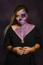 Portrait of a woman with sugar skull makeup. Halloween make-up. Portrait of Calavera Catrina Royalty Free Stock Photo