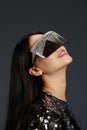 portrait woman sunglasses big glasses shiny style fashion Gray background Royalty Free Stock Photo