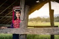 Portrait of woman tribal Lisu in traditional clothing and jewelry costume in cottage., Lifestyle of hill tribe girl in the north