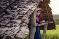 Portrait of Woman Tribal Lisu in Traditional Clothing and Jewelry Costume in Cottage., Lifestyle of Hill Tribe Girl in The North