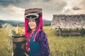 Portrait of woman tribal Lisu in traditional dress and jewelry costume in rice fields., Lifestyle of hill tribe girl in the north