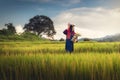 Portrait of woman tribal Lisu in traditional dress and jewelry costume in rice fields., Lifestyle of hill tribe girl in the north Royalty Free Stock Photo