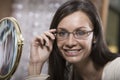 Portrait Of A Woman Trying On New Spectacles At Shop Royalty Free Stock Photo