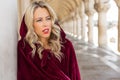 Portrait of woman in vintage red cloak Royalty Free Stock Photo