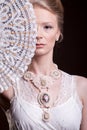 Portrait of woman in vintage victorian dress with a oriental fan Royalty Free Stock Photo