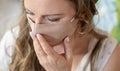 Portrait of woman wearing handmade cotton fabric face mask. Protection against saliva, cough, dust, pollution, virus, bacteria,