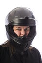 Portrait of a woman wearing a motocycle helmet