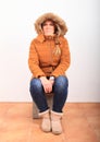 Portrait of woman in winter jacket with hoot Royalty Free Stock Photo