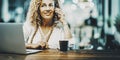 Portrait of woman worker with laptop and phone. Female people calling with mobile cellular and using computer sitting at the cafe Royalty Free Stock Photo