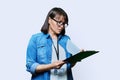 Portrait of woman worker with industrial center card clipboard, on white background
