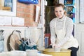 Portrait Of Woman Working At Pottery Wheel In Studio Royalty Free Stock Photo