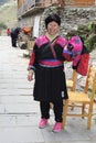 Portrait of a woman in traditional costrume of the Red Yao hill tribes, Longji, China