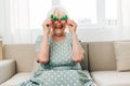 Woman grandmother couch mature happiness christmas elderly home Royalty Free Stock Photo