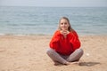 Portrait of beautiful woman Yogi on the beach