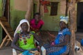 Portrait of women in front of their home in the village of Mandina Mandinga in the Gabu Region