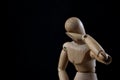 Wooden Mannequin Looking Sad And Depressed On Black Background Royalty Free Stock Photo