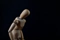 Wooden Mannequin Looking Sad And Depressed On Black Background Royalty Free Stock Photo