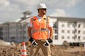Portrait worker in construction helmet. Engineer builder foreman or repairman. Worker at building site. Construction