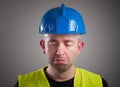 Portrait of a worker expressing negativity and sad