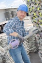 Portrait worker holding scaffolding pole Royalty Free Stock Photo