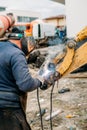 worker using arc welding machine for working on construction site Royalty Free Stock Photo
