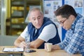 Portrait workers on coffee break