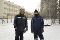 Two workers at the site of the ice camp