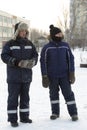 Two workers at the site of the ice camp