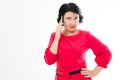 Portrait of a worried middle aged woman talking on telephone Royalty Free Stock Photo