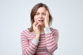 Portrait of a worried woman. Isolated white background. Royalty Free Stock Photo