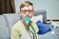 Portrait of an 11-year-old boy playing doctor .