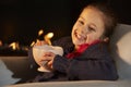 Portrait 7 year old girl by firelight Royalty Free Stock Photo
