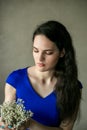 Portrait of youn woman with long hair and flowers Royalty Free Stock Photo