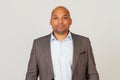 Portrait of a young African American guy businessman smiling and looking at the camera, looking trustworthy and sincere with a Royalty Free Stock Photo