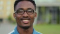 Portrait of young african american man with beard in glasses looking at camera. Portrait of a happy handsome young man Royalty Free Stock Photo