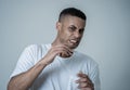 Portrait of a young man looking scared and shocked at something. Human expressions and emotions Royalty Free Stock Photo