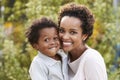 Portrait of young African American mother with toddler son