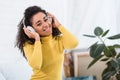 Portrait of young african american woman listening music Royalty Free Stock Photo