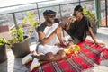 Portrait of happy African gay couple having romantic date Royalty Free Stock Photo