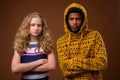 Portrait of young African man and Caucasian teenage girl Royalty Free Stock Photo