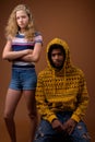 Portrait of young African man and Caucasian teenage girl Royalty Free Stock Photo