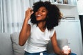 Portrait young African tasting cherry cake in concept special dish. Tastemaker. Royalty Free Stock Photo