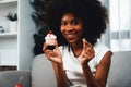 Portrait young African tasting cherry cake in concept special dish. Tastemaker. Royalty Free Stock Photo