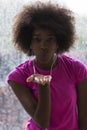 Portrait of young afro american woman in gym while listening mus Royalty Free Stock Photo