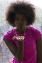 Portrait of young afro american woman in gym while listening mus Royalty Free Stock Photo
