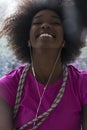 Portrait of young afro american woman in gym while listening mus Royalty Free Stock Photo