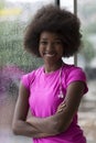 Portrait of young afro american woman in gym while listening mus Royalty Free Stock Photo